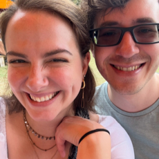 Katrina smiling with a friend in a selfie