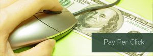 keyoboard mouse over top of a 100 dollar bill