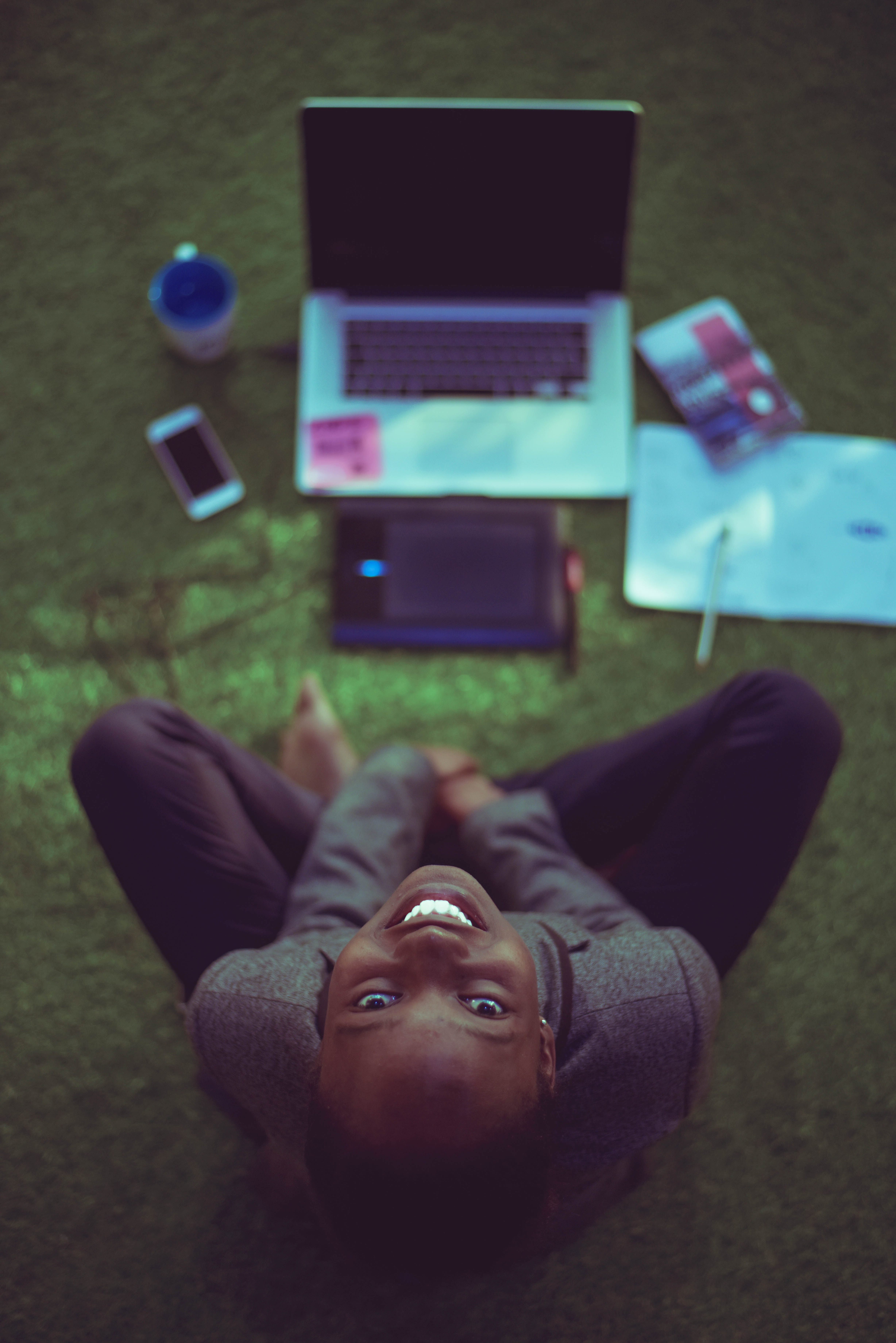 lady looking up with laptop
