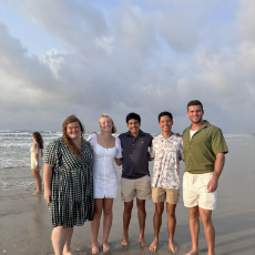 David at the beach with friends and family.