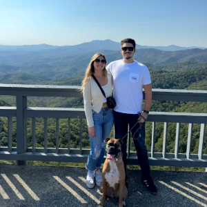 Joel with family and dog