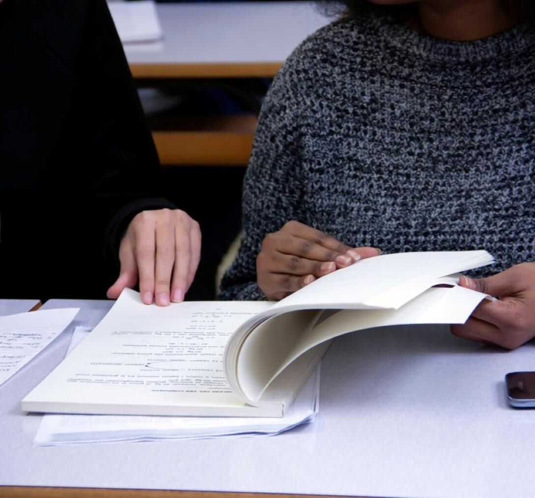 students reading textbooks