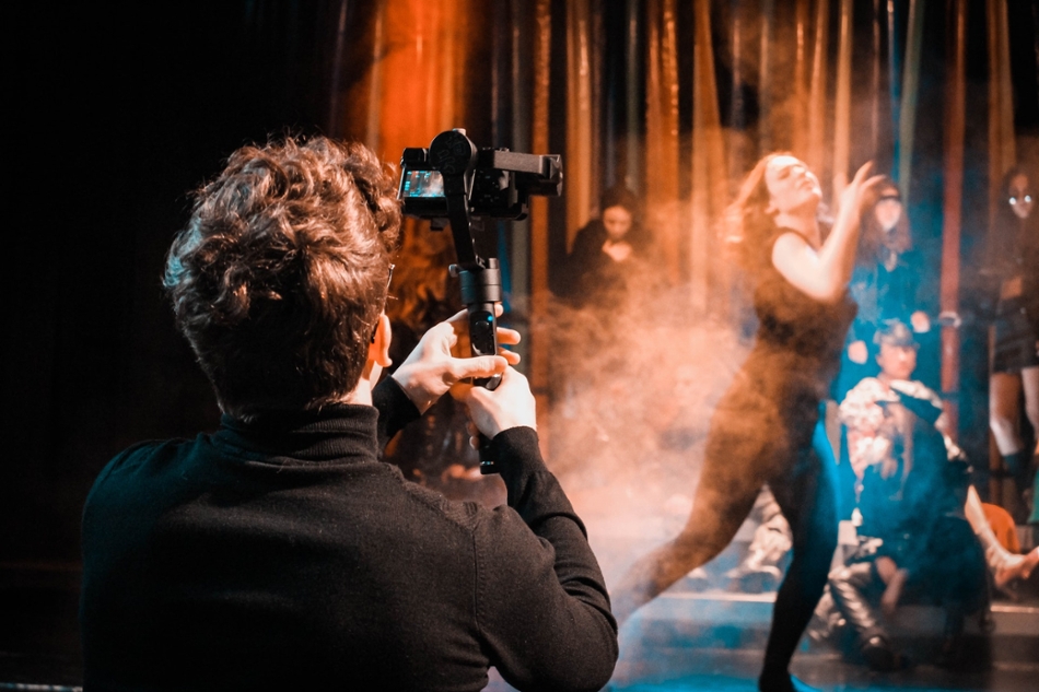photographer taking pictures of dancers
